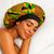 Mujer-durmiendo-con-cofia-Kente